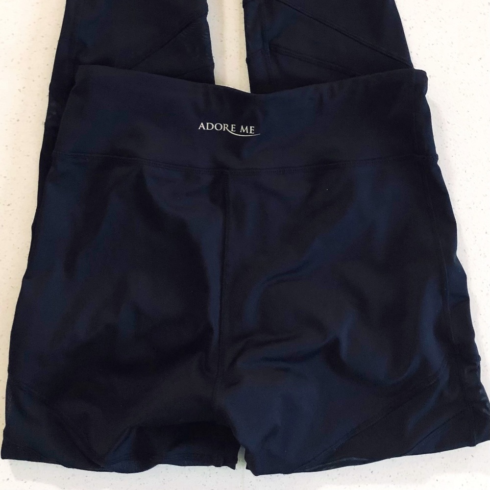 Black leggings with sheer panels